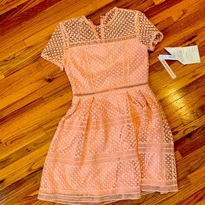 Beautiful dress from AQUA color: peach/pink size: xs